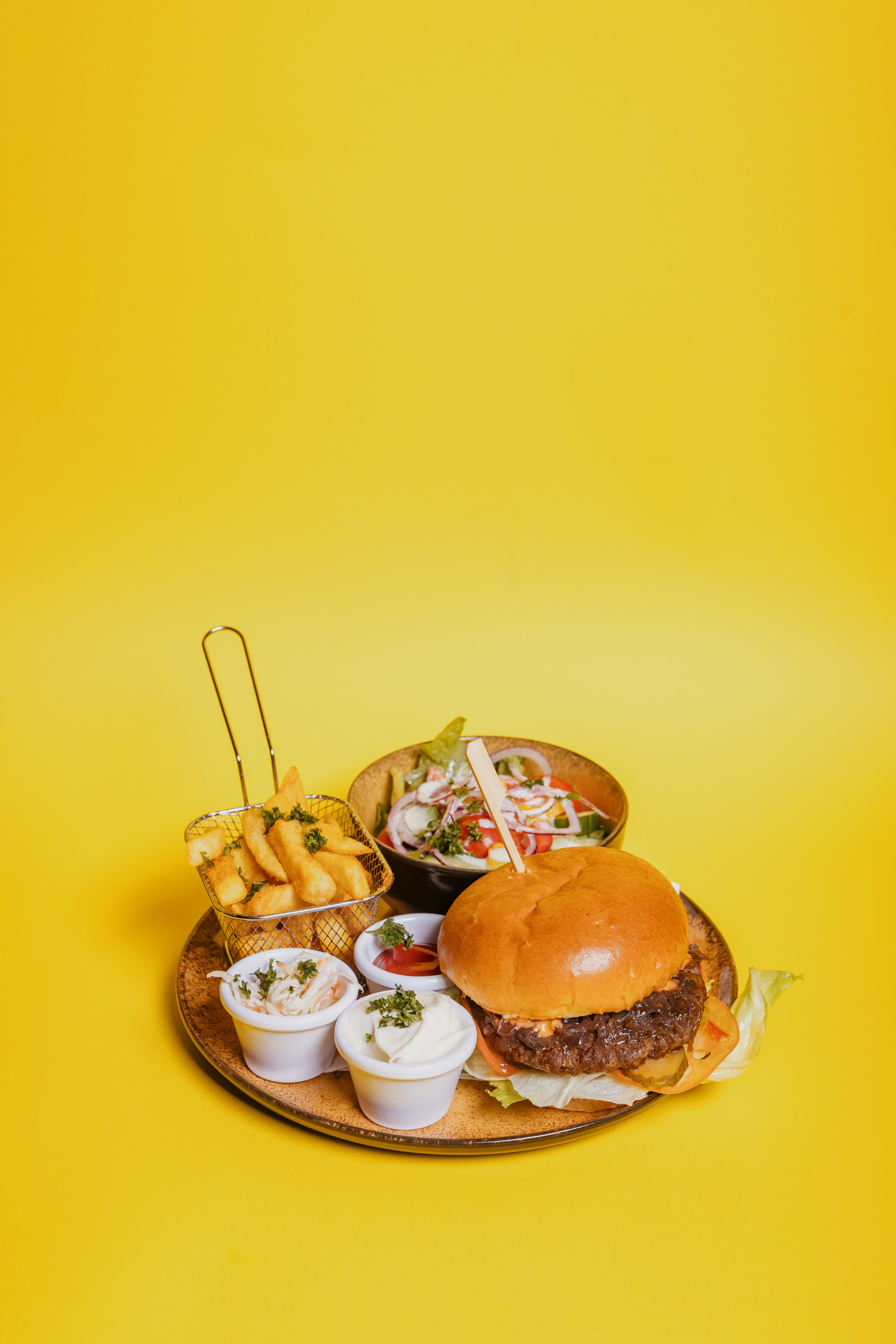 Juicy Bearburger cheeseburger with melted cheese, oozing sauce and a toasted brioche bun